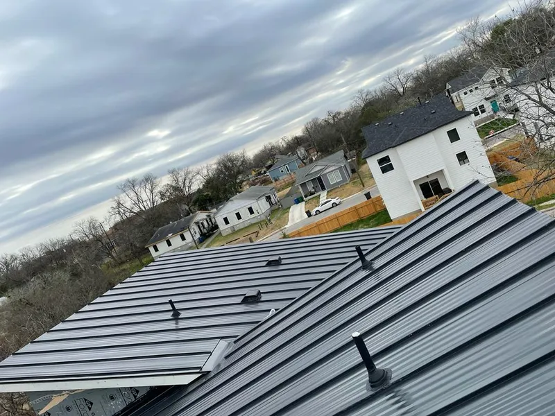 Standing seam metal roof panels with vents for Skylight Repair in Rogers